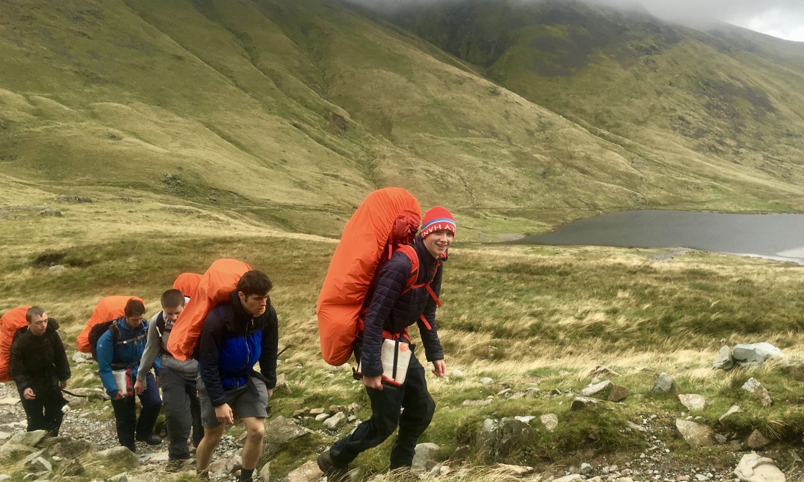 DofE group walking with rucksacks on their bronze award